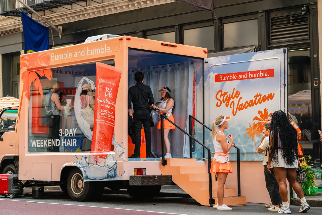 Glass truck carrying a Bumble&Bumble campaign in New York