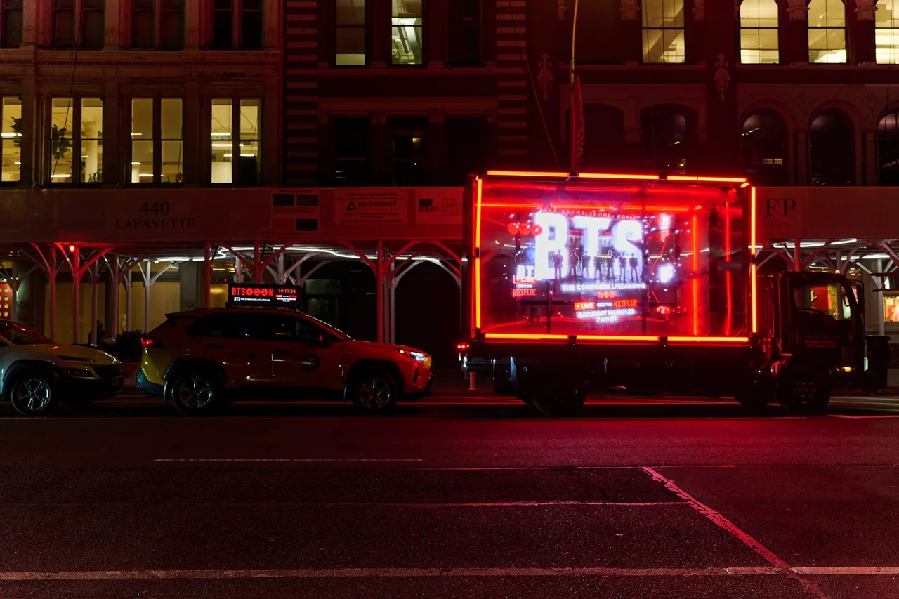 Hologram truck carrying a BTS campaign in New York