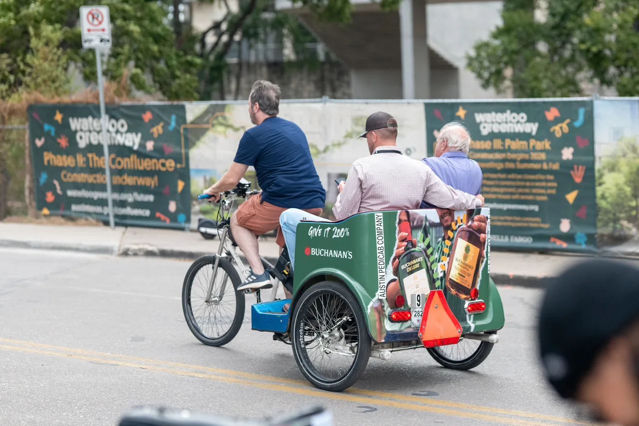 Pedicab carrying a Buchanan campaign in Austin