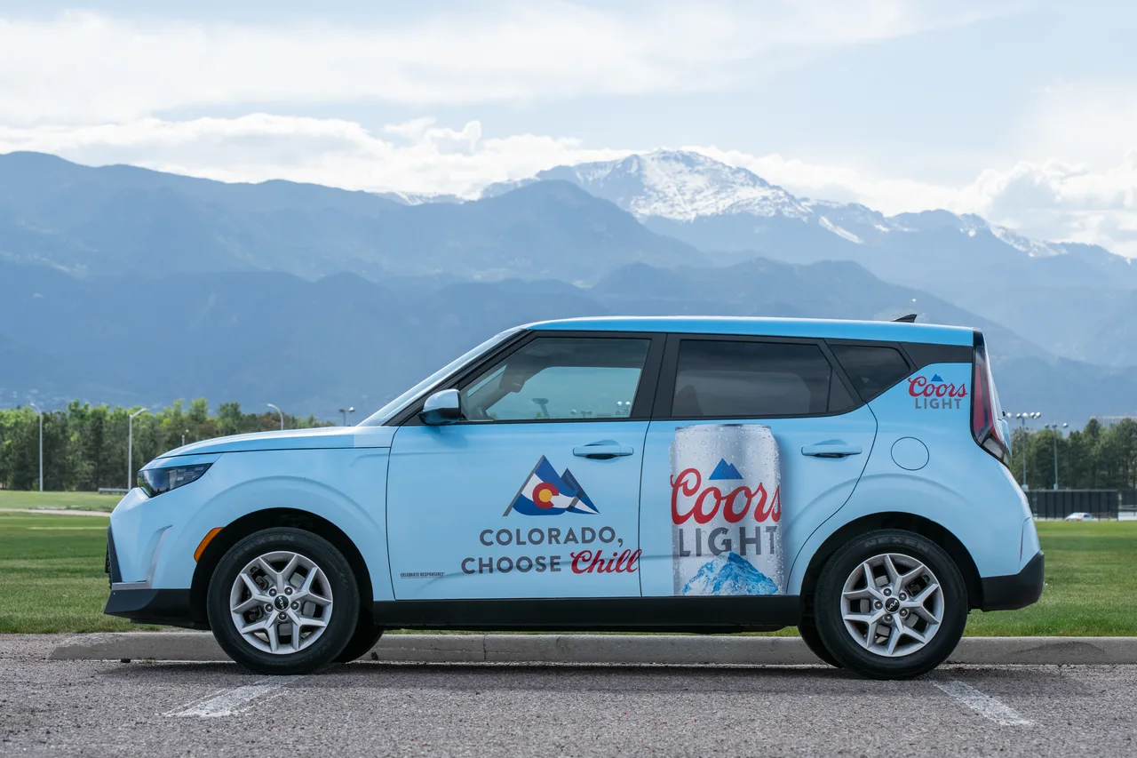 Vehicle wrap carrying a Coorslight campaign in Colorado