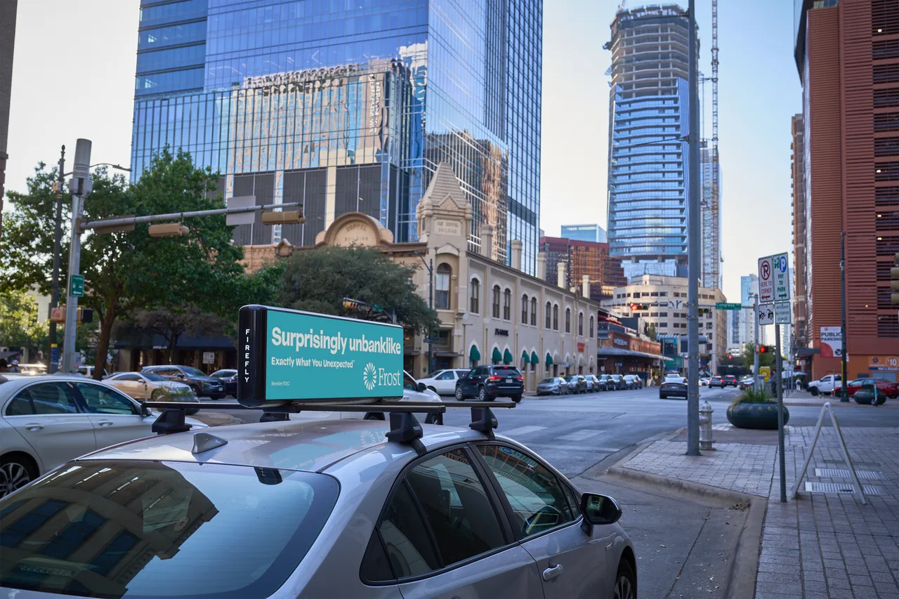 Digital screen carrying a FrostBank campaign in Austin