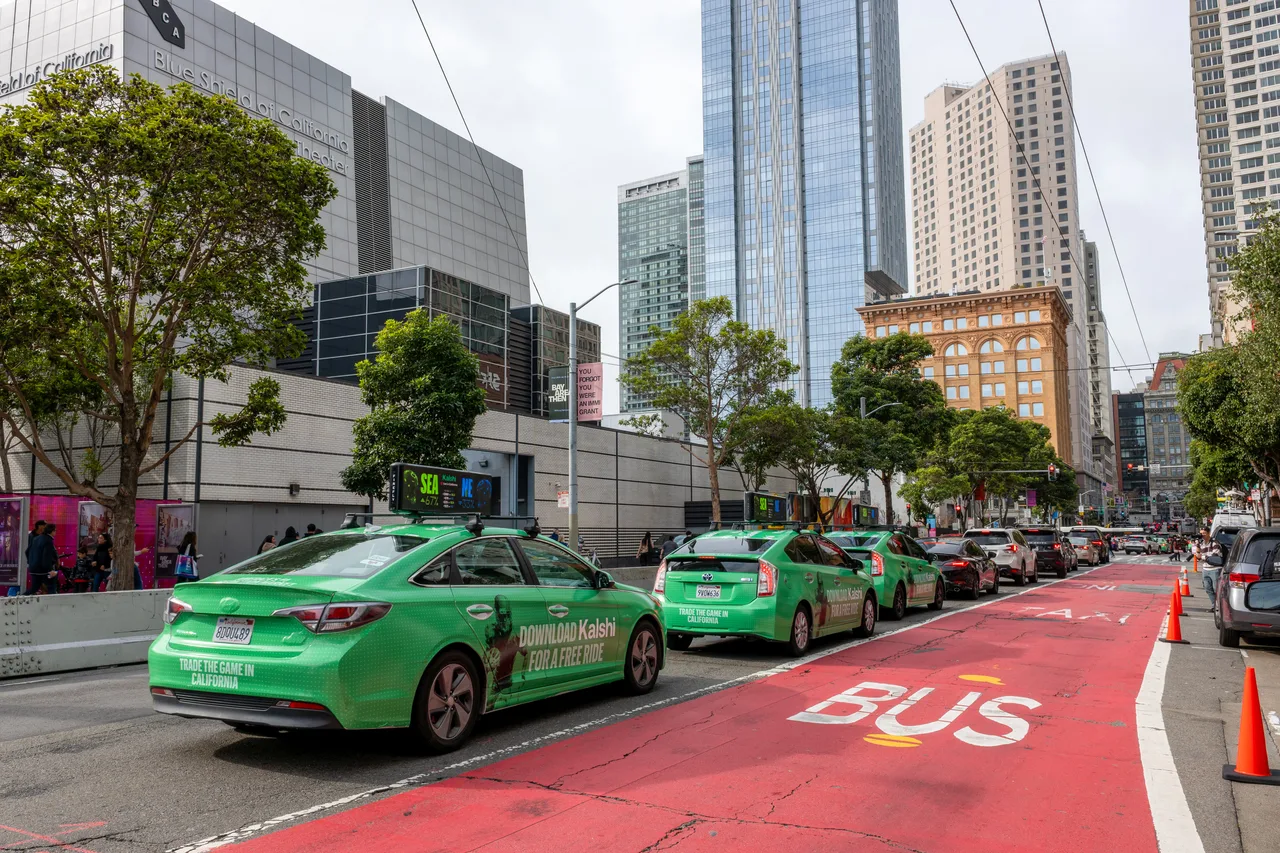 Vehicle wrap carrying a Kalshi campaign in San Francisco