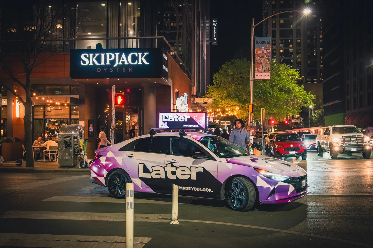 later.com campaign on a digital screen in Austin, 2026