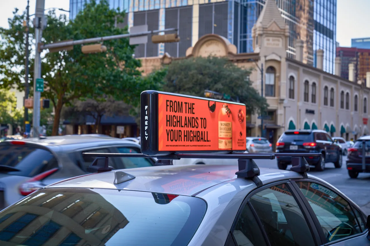 MonkeyShoulder campaign on a digital screen in Austin, 2024