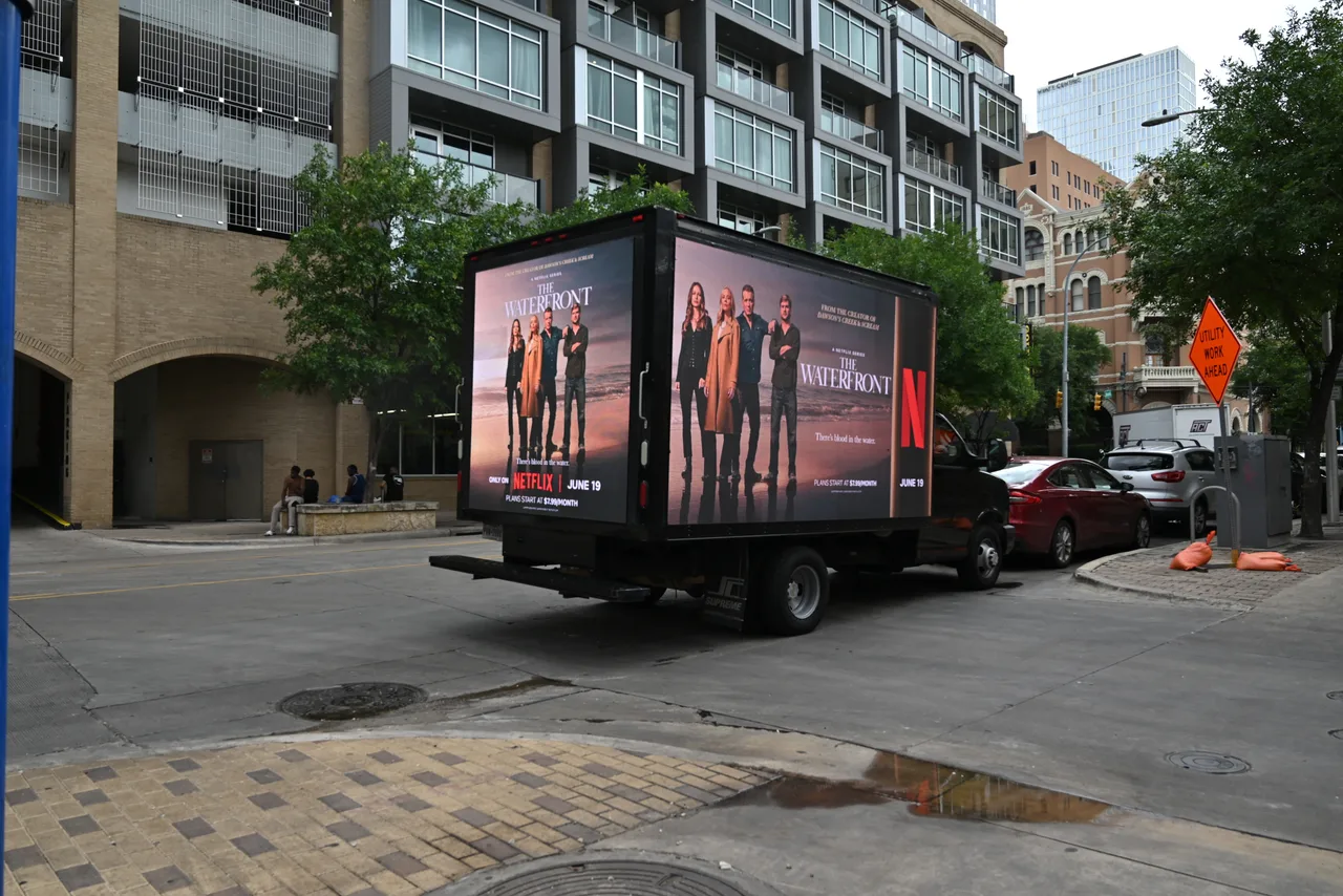 LED truck carrying a NetflixWaterfront campaign in Austin