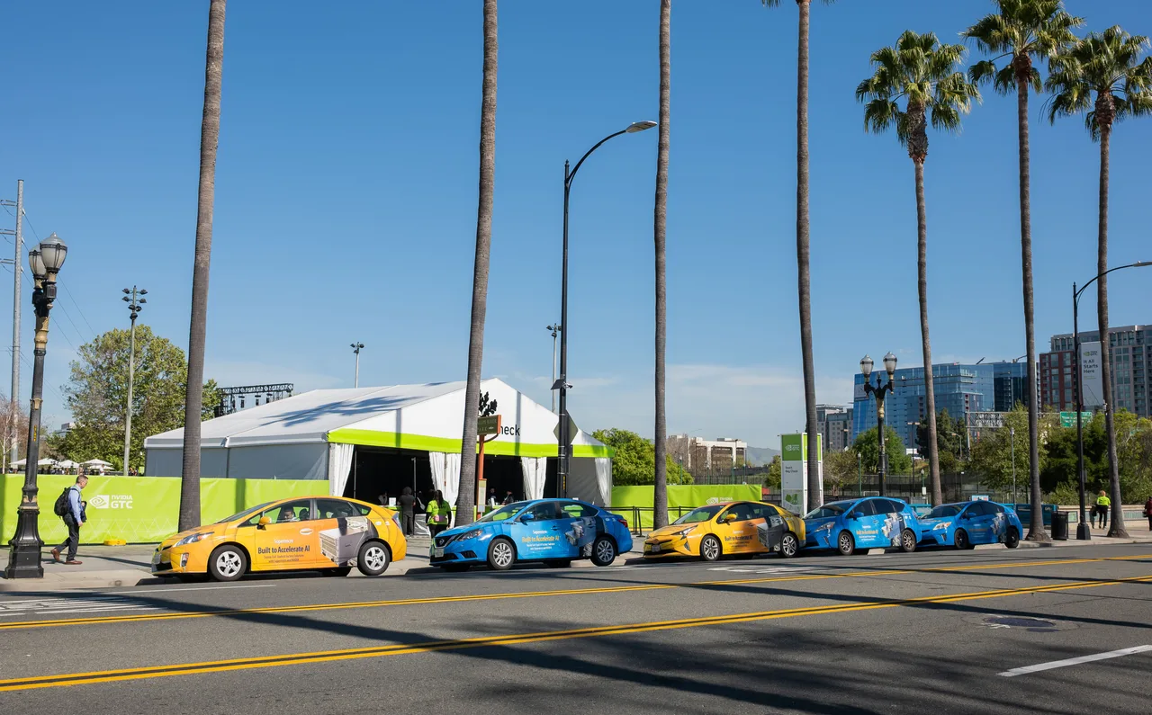 Vehicle wrap carrying a Supernicro campaign in San Jose
