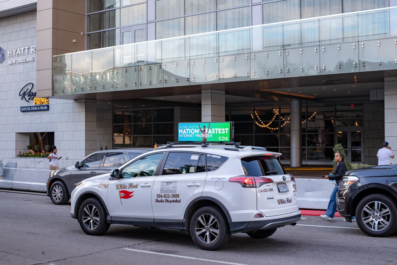 Digital screen carrying a Dentsu campaign in New Orleans