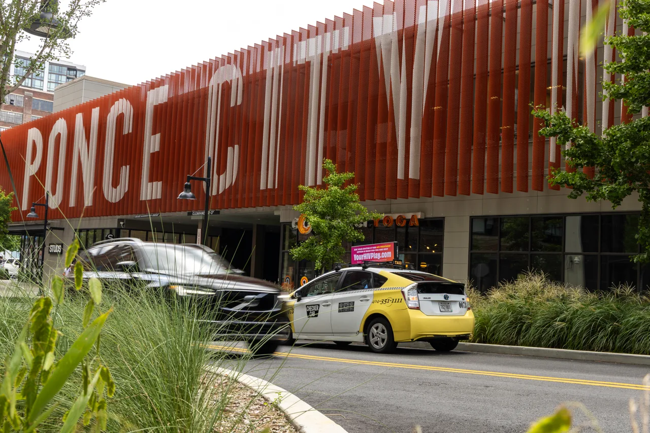 Gilead campaign on a digital taxi-top screen at Ponce City Market, Atlanta, 2025