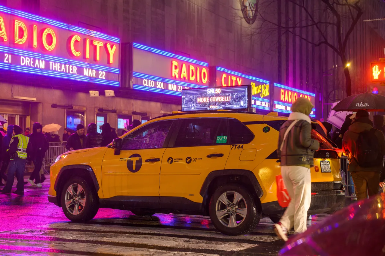 SNL50 campaign on a digital screen in New York, 2025