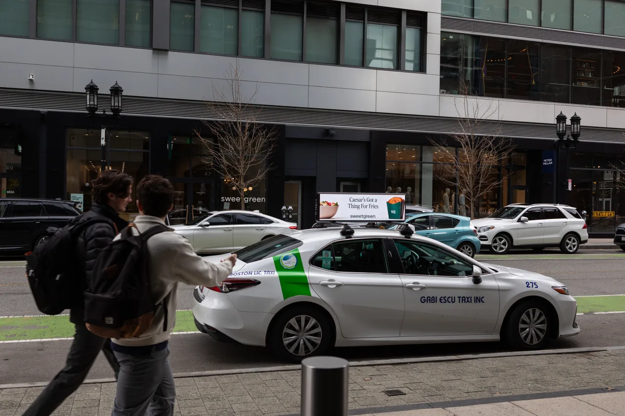 Digital screen carrying a Sweetgreen campaign in Boston