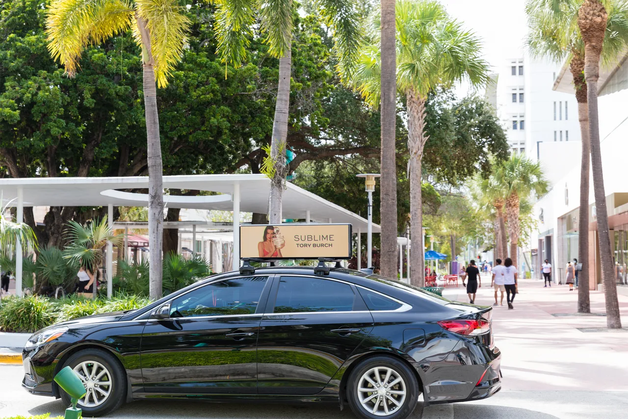 ToryBurch campaign on a digital screen in Miami, 2024