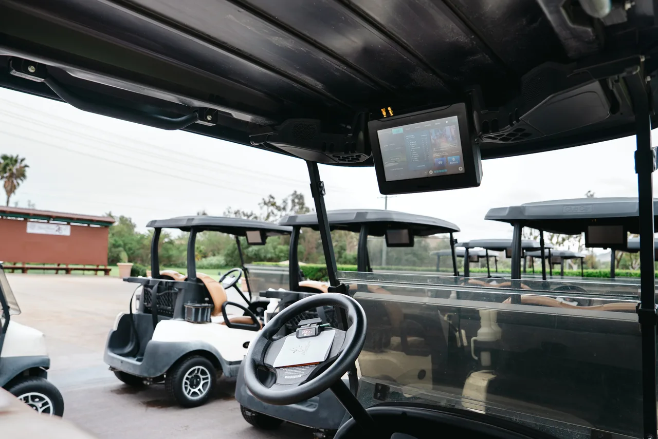 Golf cart screen carrying a GooseCreekGolfClub campaign in Los Angeles