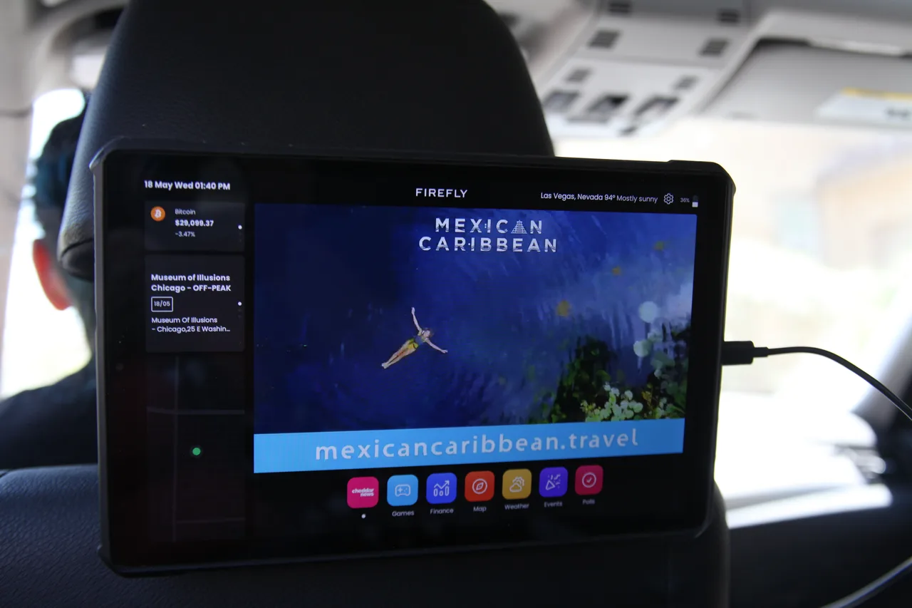 In-car screen carrying a QuintanarooTourism campaign in Chicago