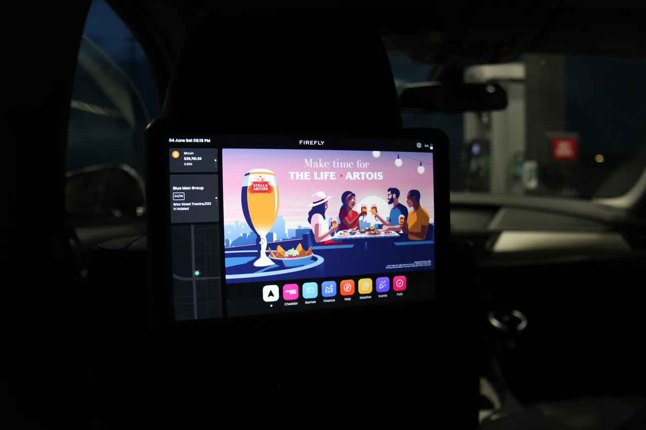 In-car screen carrying a Stella campaign in Washington DC