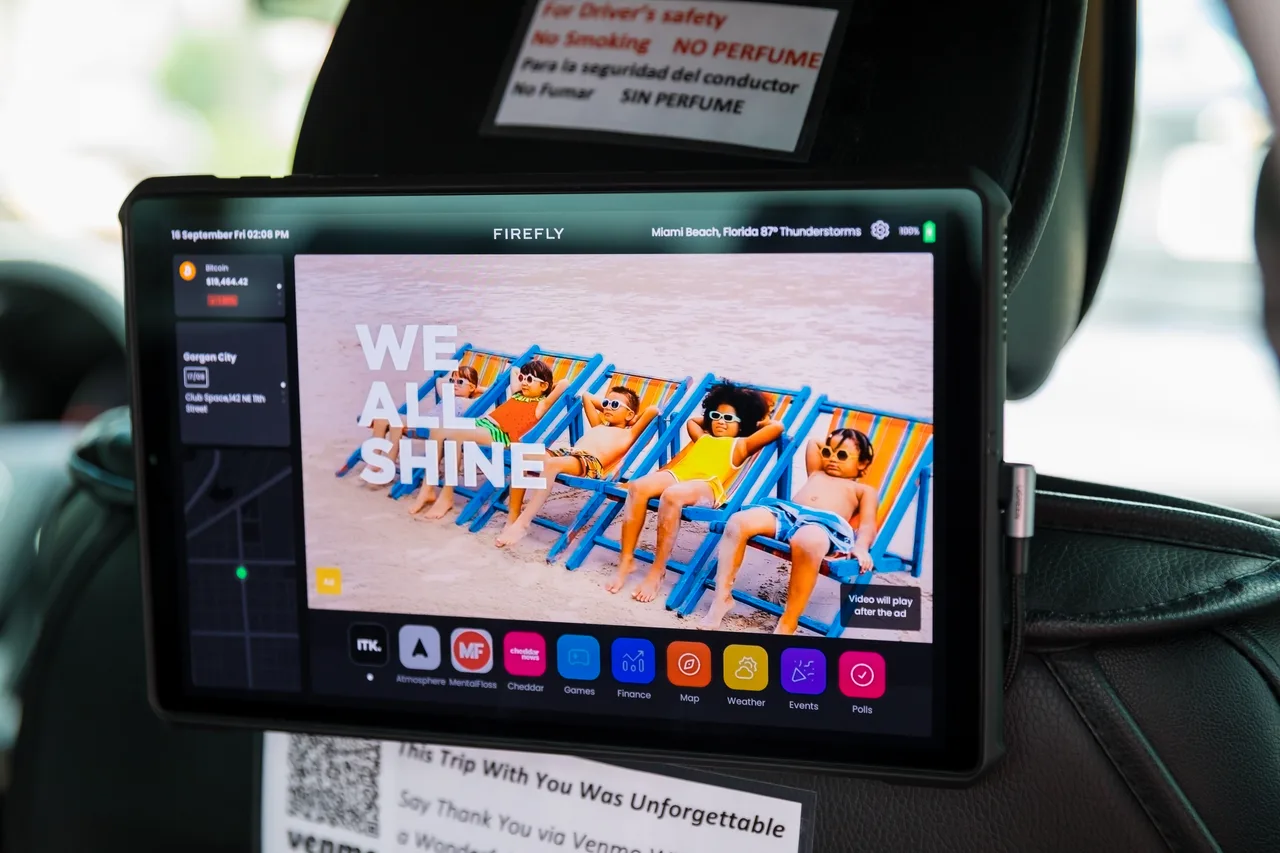 In-car screen carrying a TropicalSmoothies campaign in Miami