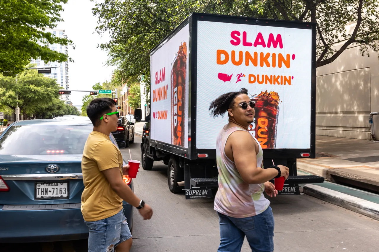 LED truck carrying a Dunkin campaign in Dallas