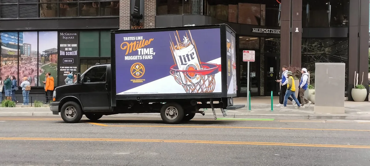 LED truck carrying a MillerLight campaign in Denver