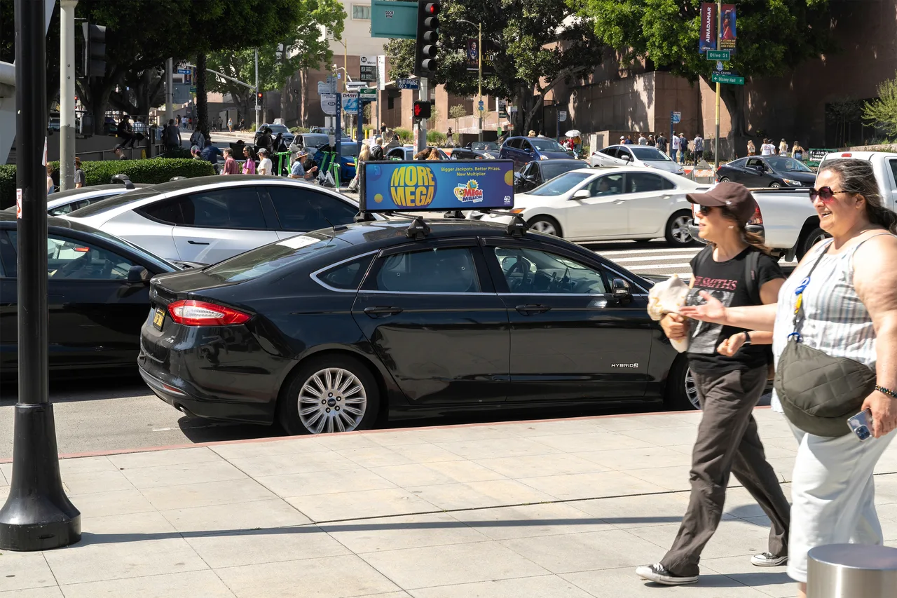 Digital screen carrying a CALottery campaign in Los Angeles