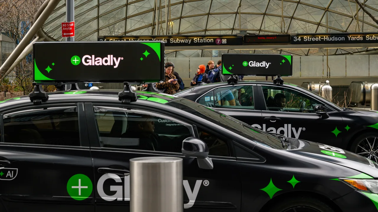 Digital screen carrying a Gladly campaign in New York