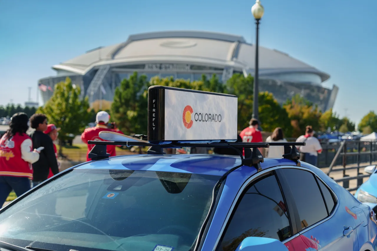 Digital screen carrying a MMGY campaign in Dallas
