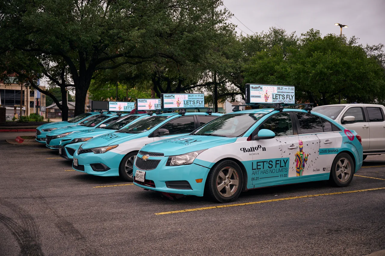 Digital screen carrying a BalloonMuseum campaign in Austin