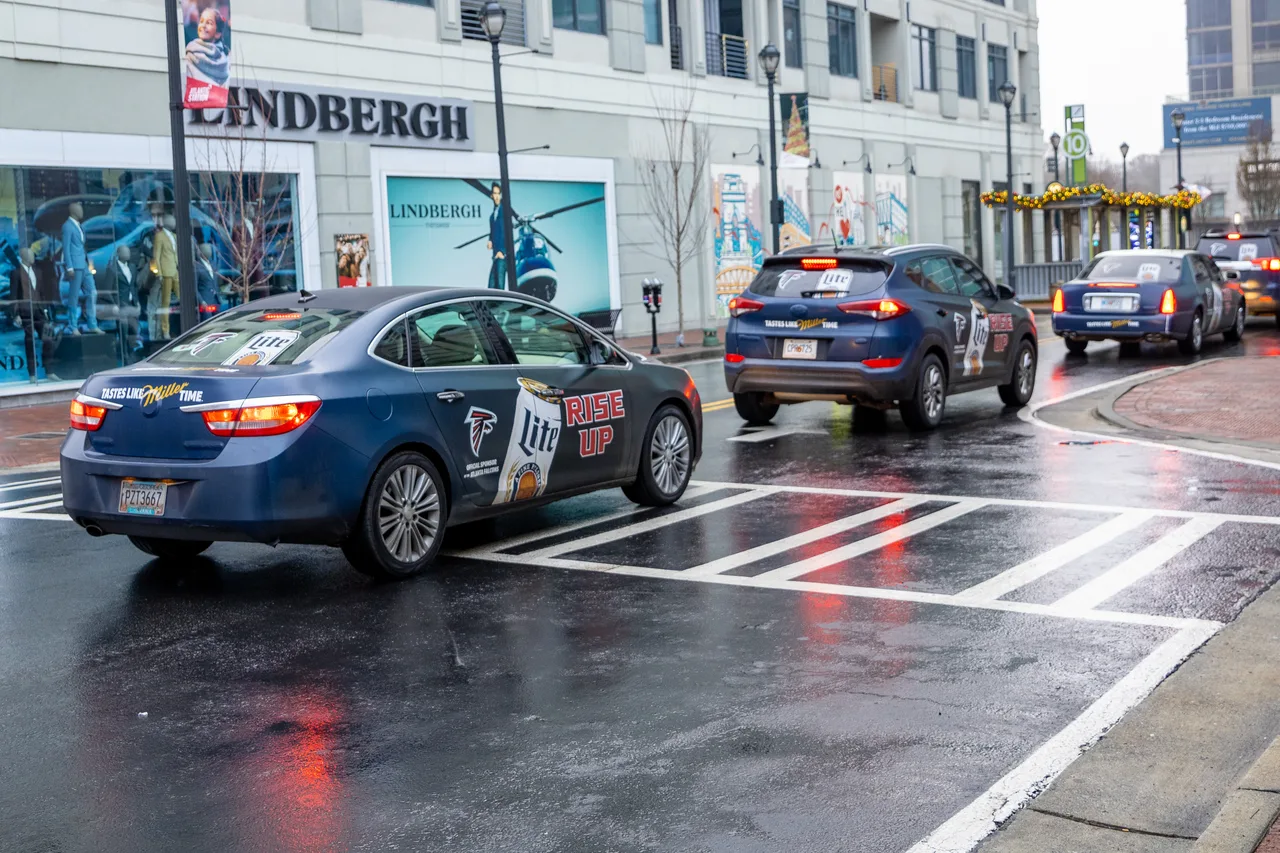 Vehicle wrap carrying a MolsonCoors campaign in Atlanta